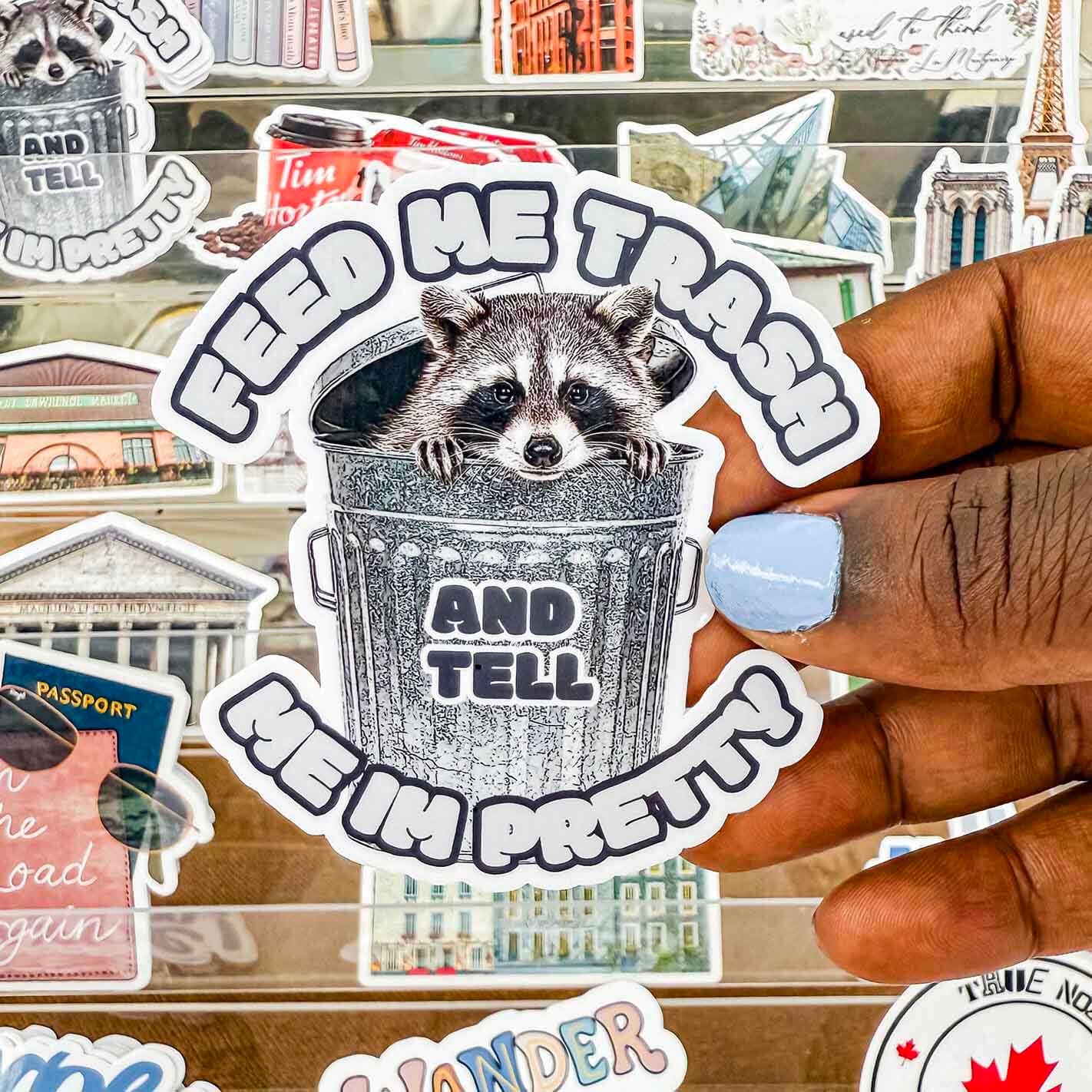 Trash panda sticker that reads "Feed me trash and tell me I'm pretty"