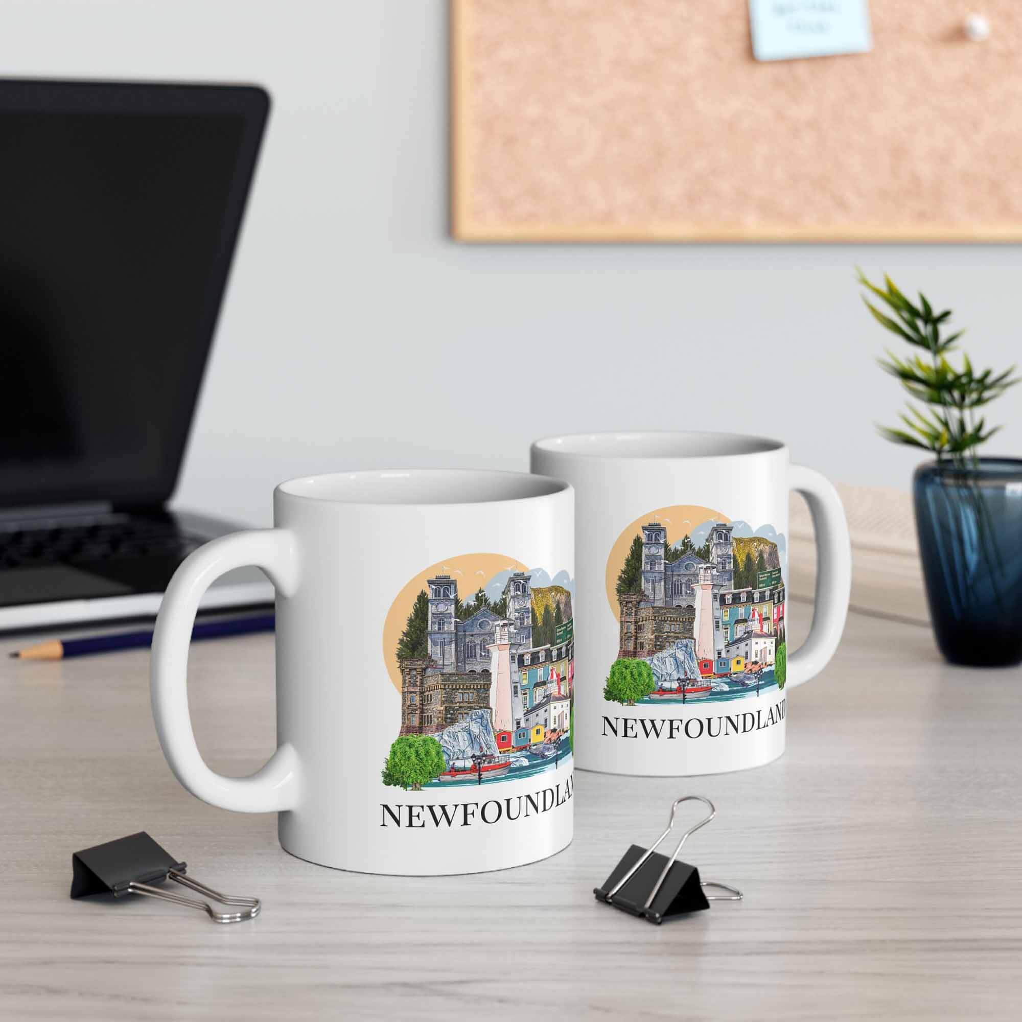Two Newfoundland ceramic mugs styled on table mockup